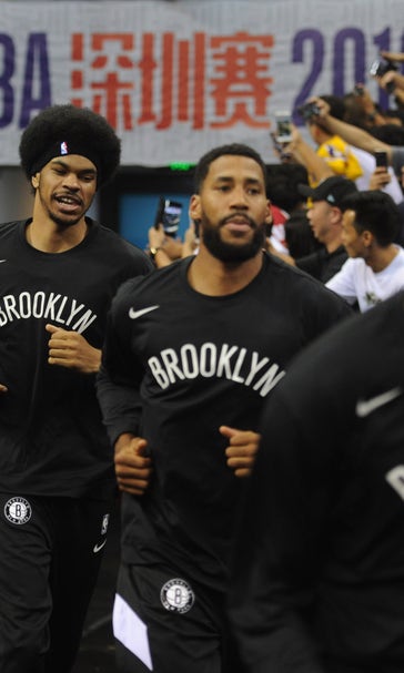 Back from China, Nets steer clear of controversy in remarks